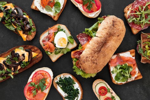 Flat lay assortment delicious sandwiches