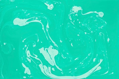 Overhead view paint green color backdrop