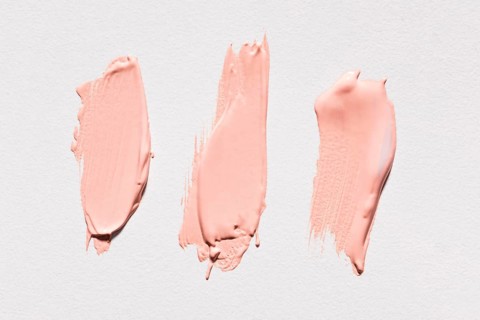 Top view pink paint brush strokes surface