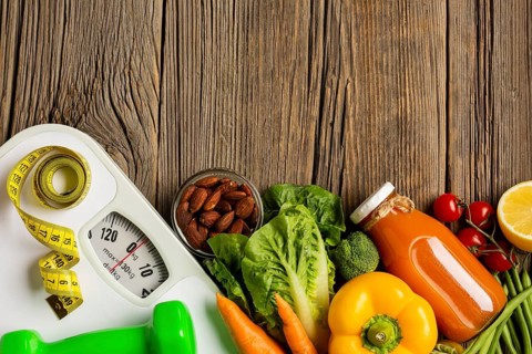 Flat lay groceries scale wood table