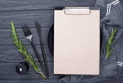 Clipboard table with plate cutlery