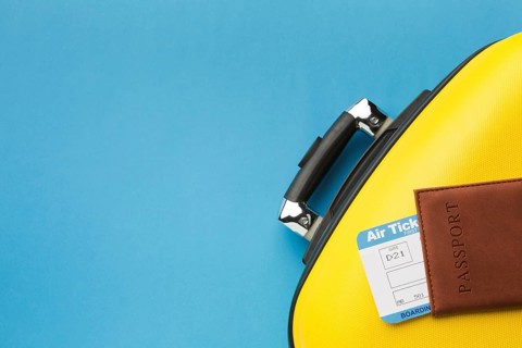 Flat lay luggage passport with copy space
