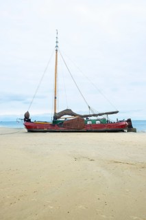 Beach with boats at West on the North Sea island of Terschelling