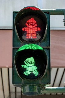 Red Mainzelmaennchen traffic light for standing and green Mainzelmaennchen traffic light for walking