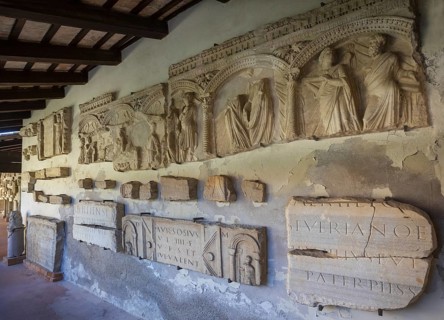 Ancient fragments of sculptures in the Grado Lapidarium