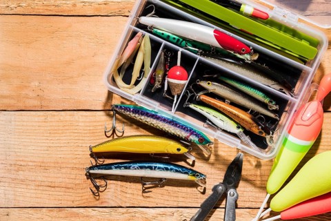 Fishing float lure with plier wooden desk
