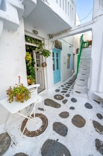 Cycladic white houses with colourful doors and shutters