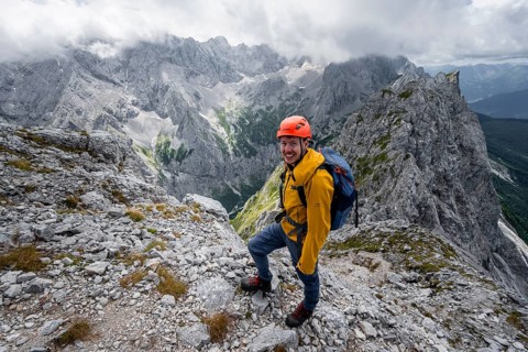 Mountaineer at the summit of the Waxenstein