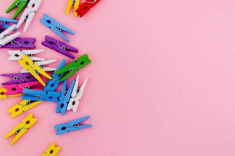 Flat lay colorful clothes pins