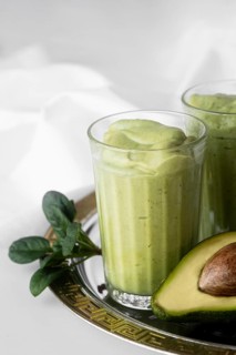 Tasty green smoothie with avocado