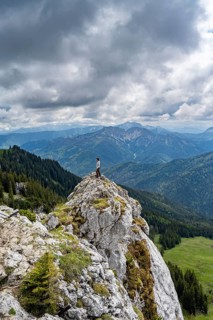 Mountaineer at the summit of Taubenstein