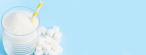 High angle glass with sugar straw