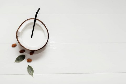 Halved coconut with copy space