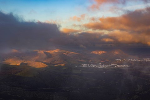 Panorama at sunrise from the Montana de Guardilama to the wine-growing area La Geria