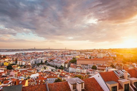View of Lisbon famous view from Miradouro da Senhora do Monte tourist viewpoint of Alfama and Mauraria old city district