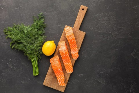 Top view salmon wooden board