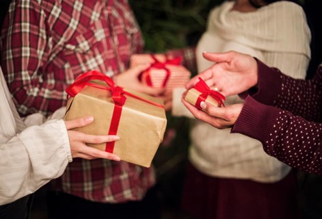 Hands people exchanging presents christmas