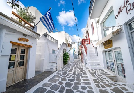 Cycladic white houses with colourful doors and shutters