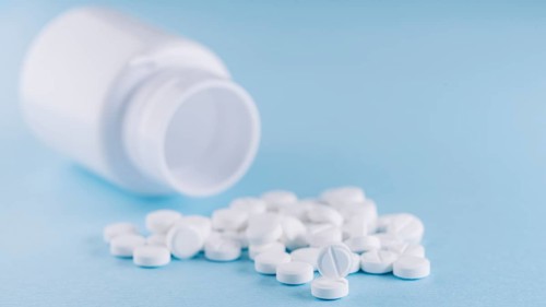 White pills plastic bottle