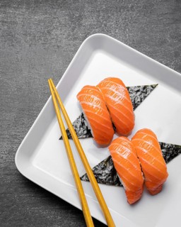 Flat lay tasty sushi plate