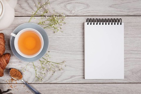 Notebook mock up wooden background