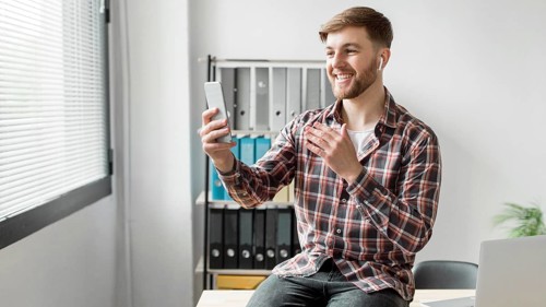 Man using mobile video call