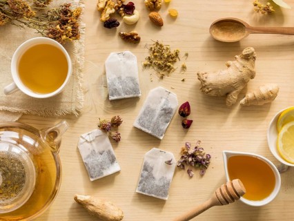 Flat lay natural medicinal herbs with tea