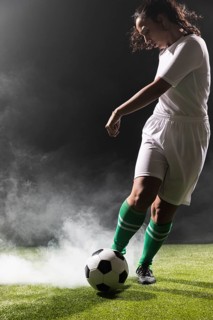 Young woman sportswear playing soccer