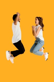 Side view friends jumping