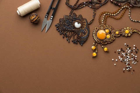 Top view essentials bead working with thread scissors