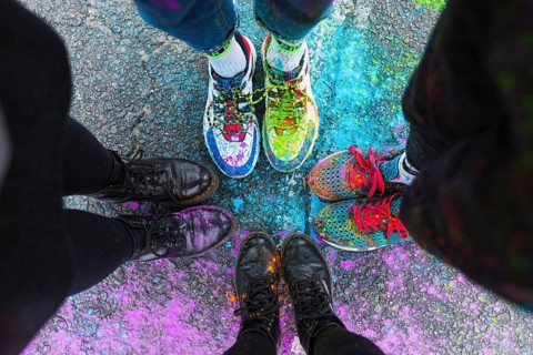 Feet people standing road colorful paint