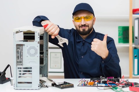 Front view man troubleshooting computer