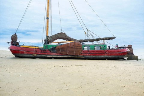 Beach with boats at West on the North Sea island of Terschelling