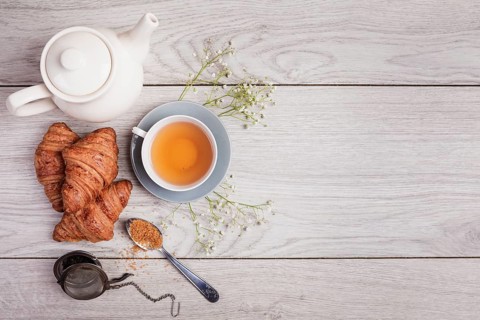 Tea croissants copy space