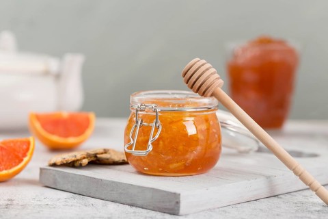 Sweet homemade natural jam honey dipper