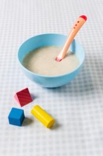 High angle baby food with toys