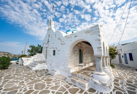 White Greek Orthodox Church Holy Church of Agios Konstantinos with Greek flag