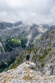 Mountaineer at the summit of the Waxenstein