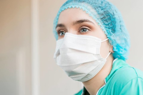 Low angle nurse with mask hospital