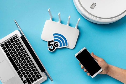 Top view wi fi router with laptop vacuum cleaner