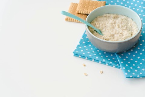 Copy space bowl with cereals biscuits