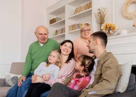 Medium shot happy family inside