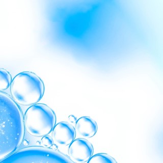 Abstract air bubbles water bright cyan blurred background