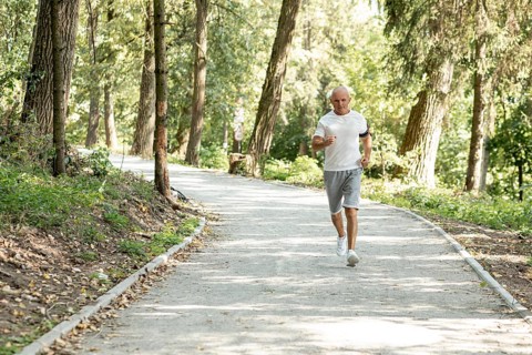 Full shot elder man running