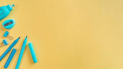 Desk school supplies light background