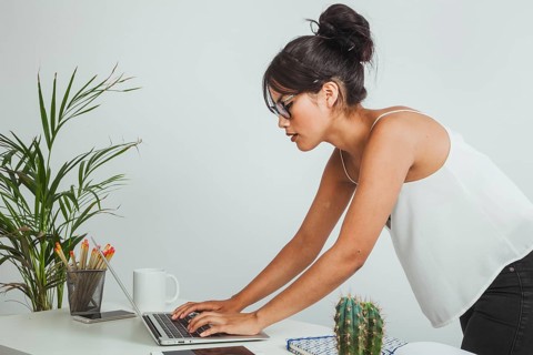 Businesswoman working with bad posture
