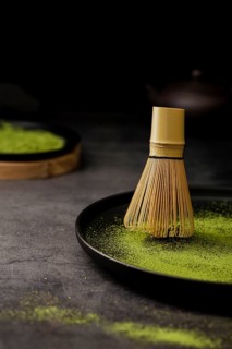 Close up bamboo whisk plate with copy space