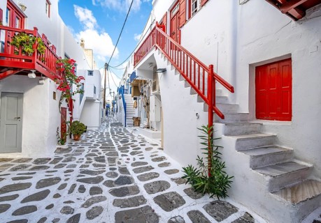 Cycladic white houses with colourful doors and shutters