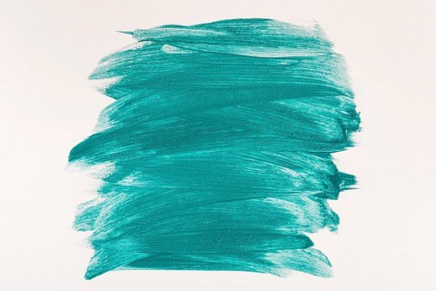 Flat lay blue paint brush strokes surface