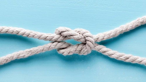 Twine strong white rope close up knot